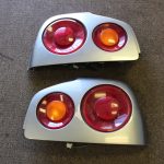 JDM NISSAN SKYLINE R 34 TAIL LIGHT ASSEMBLIES AND COVER SET  R-L OEM